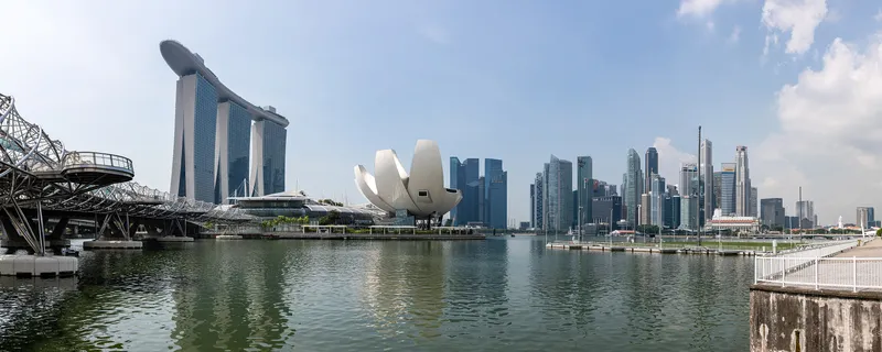 Marina Bay Sands, the ArtScience Museum and the business district across Marina Bay on a sunny day